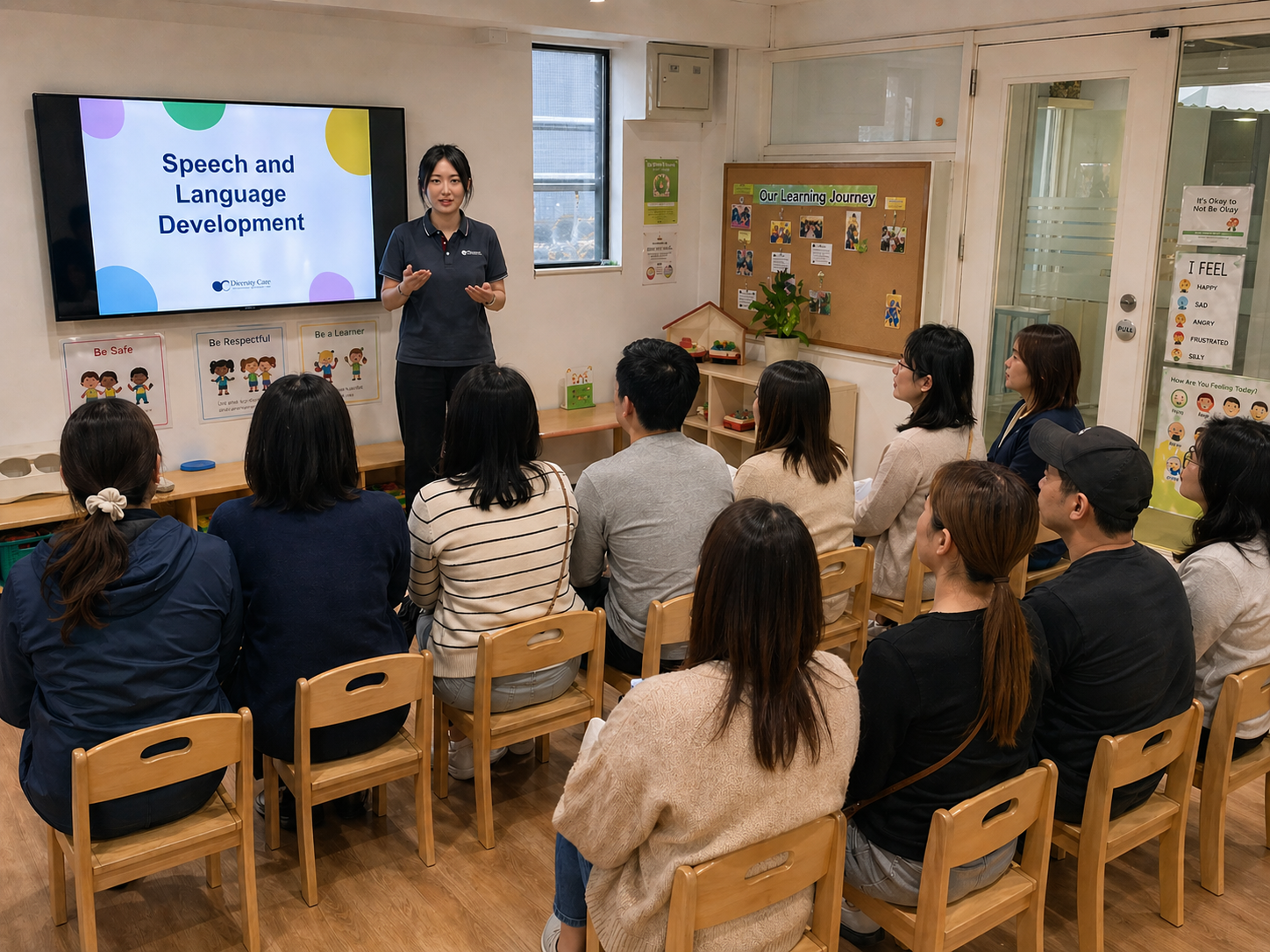A Diversey Care speech pathologist presenting a Speech and Language Development session to parents
